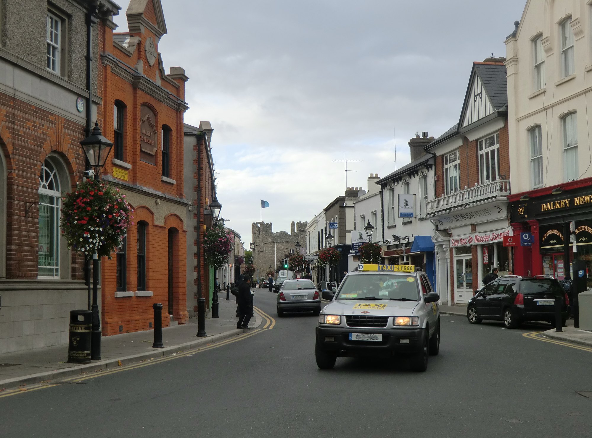 Castle Street in Dalkey village, looking towards Dalkey Castle — the shop is on the upper floor at number 19, not pictured as its own shopfront
